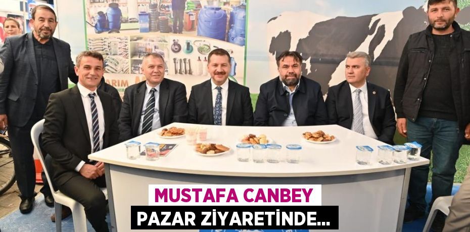 Mustafa Canbey pazar ziyaretinde...