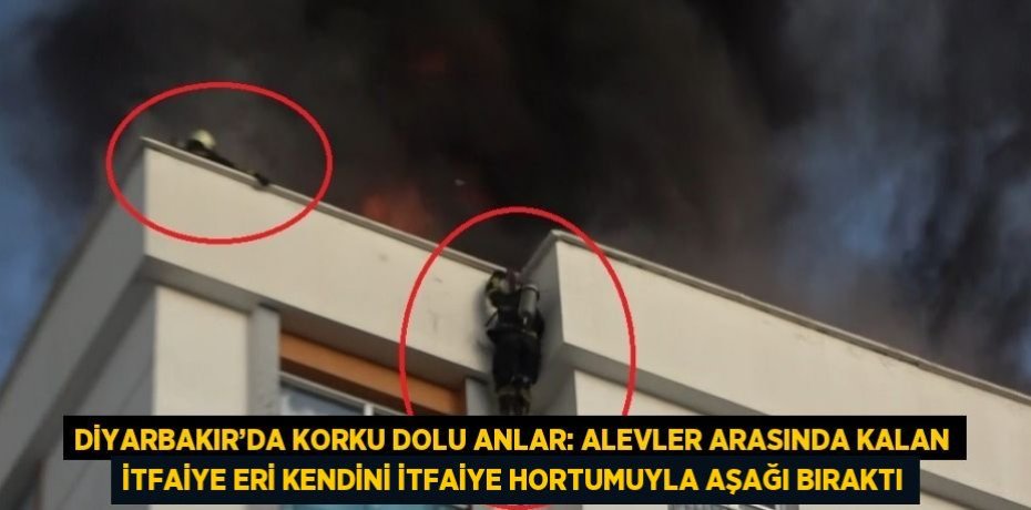 DİYARBAKIR’DA KORKU DOLU ANLAR: ALEVLER ARASINDA KALAN İTFAİYE ERİ KENDİNİ İTFAİYE HORTUMUYLA AŞAĞI BIRAKTI