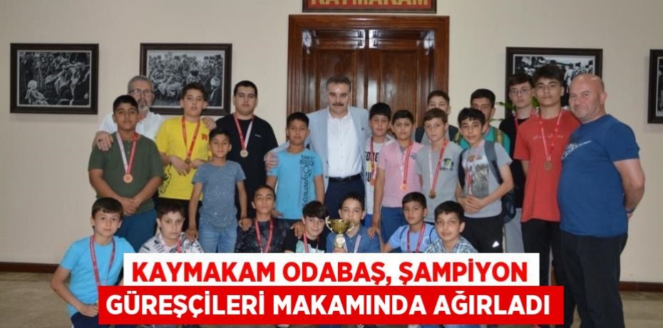 Kaymakam Odabaş, şampiyon güreşçileri makamında ağırladı