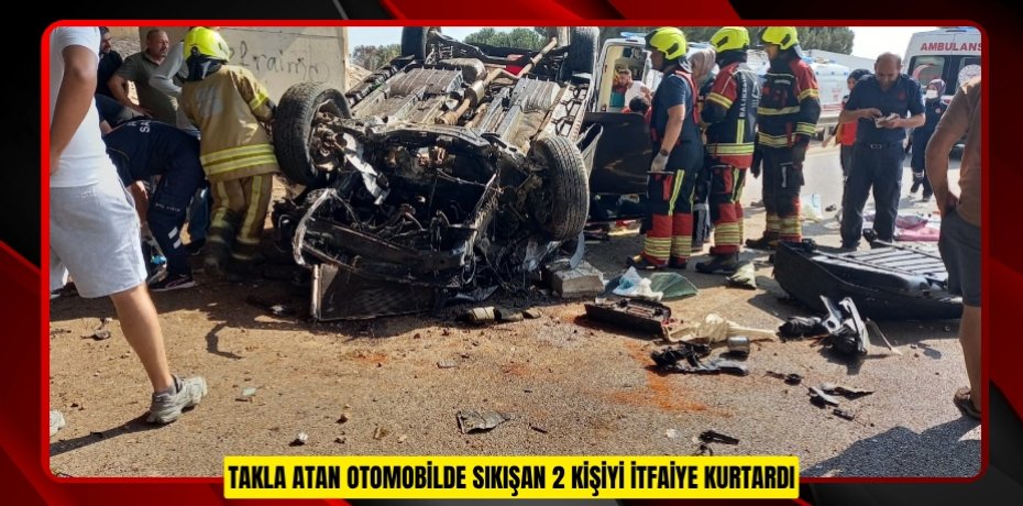 Takla atan otomobilde sıkışan 2 kişiyi itfaiye kurtardı