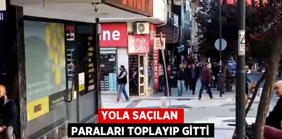 YOLA SAÇILAN PARALARI TOPLAYIP GİTTİ