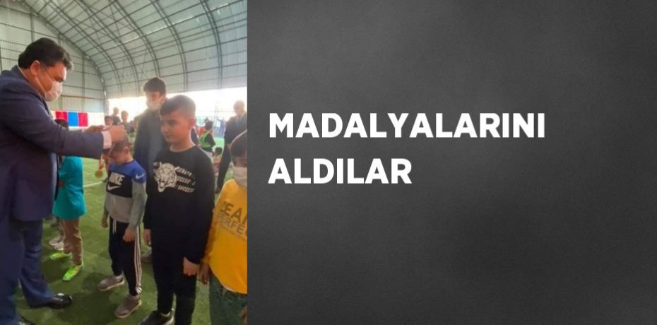 MADALYALARINI ALDILAR