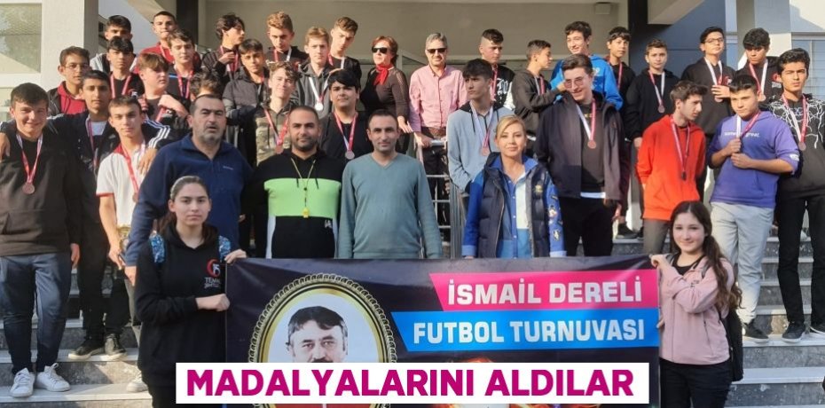 MADALYALARINI ALDILAR