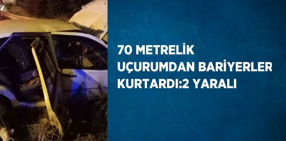 70 METRELİK UÇURUMDAN BARİYERLER KURTARDI:2 YARALI